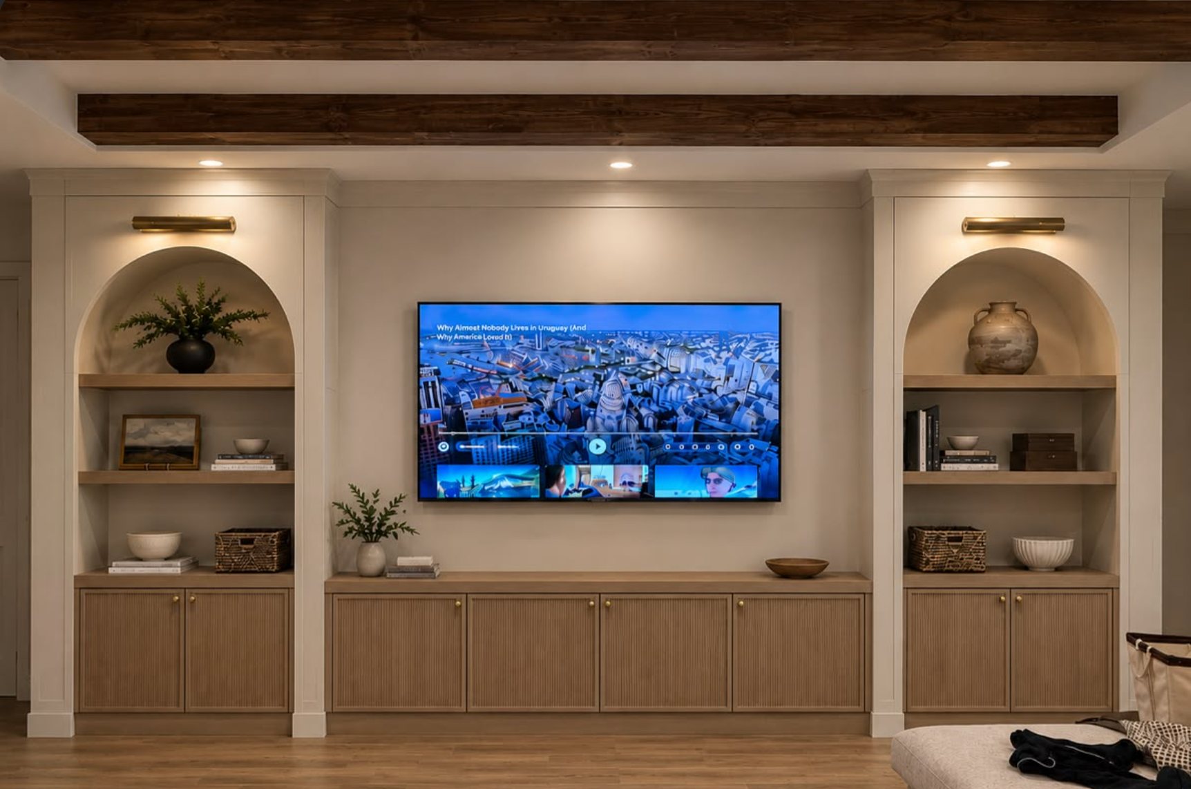 SkyVision wall-mounted TV centered between custom built-ins